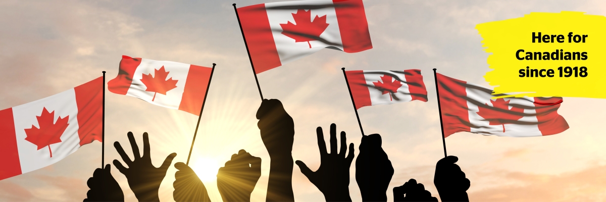 Several silhouetted hands hold small Canadian flags in the air against the sunset. The words “Here for Canadians since 1918” appear in the corner of the image